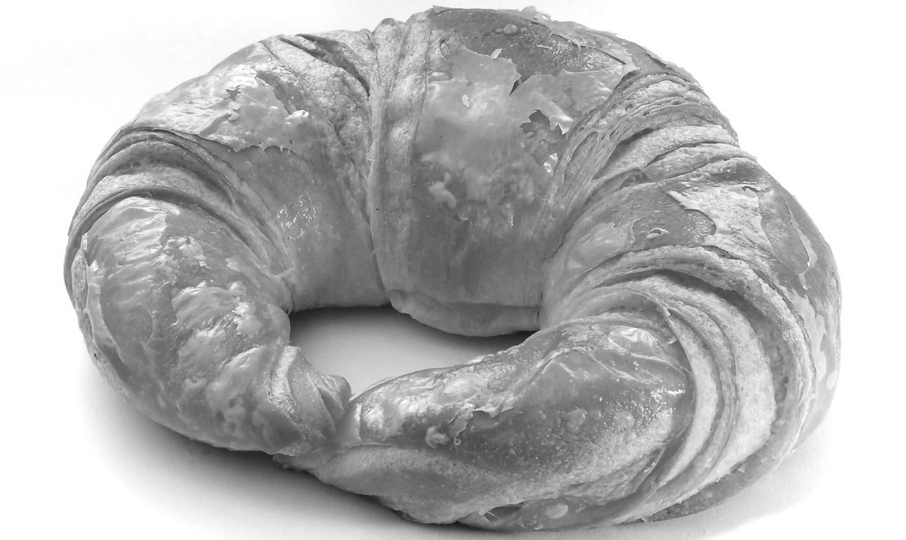 This image has an empty alt attribute; its file name is A-croissant-a-crescent-shaped-French-pastry-made-from-laminated-yeast-leavened-dough.-.jpg
A croissant, a crescent-shaped French pastry made from laminated, yeast-leavened dough and butter. 